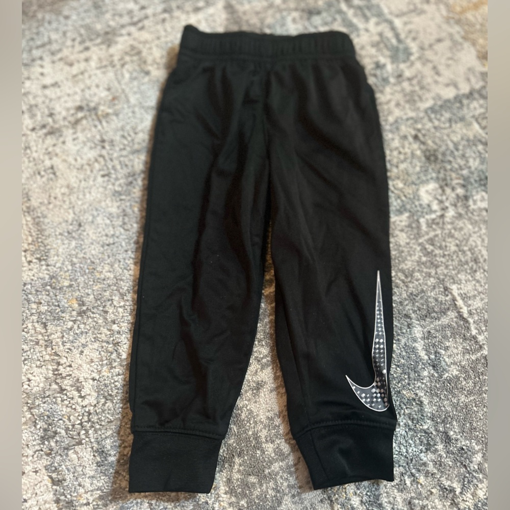 Nike Kids Black Sweatpants with Silver Logo